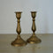 A Pair Of Brass Candle Stick Holders