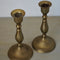 A Pair Of Brass Candle Stick Holders